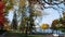 Beautiful autumn foliage and traffic on the parkway of Lake Calhoun or Lake Bde Maka Ska in Minneapolis, Minnesota