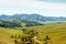 Beautiful autumn landscape. Road, hills and mountains