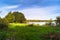 Beautiful autumn landscape.View of the ancient glacial lake surrounded by trees