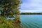 Beautiful autumn landscape.View of the ancient glacial lake surrounded by trees