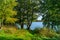 Beautiful autumn landscape.View of the ancient glacial lake surrounded by trees