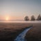 Beautiful autumn misty sunrise landscape. foggy morning and hoary frost at scenic high grass meadow. made