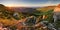 Beautiful autumn morning above green forest valley in national p