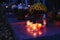 Beautiful autumn night concept. Cemetery and Halloween. Candle in the grave. Background for Halloween.