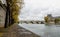 Beautiful autumn scene at Seine river embankment near Pont Royal bridge, Paris