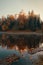 Beautiful autumn sunrise scenery of TrakoÅ¡Ä‡an Castle on the hill reflected in the lake in Croatia, county hrvatsko zagorje