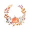 Beautiful autumn wreath with watercolor pumpkins, fall leaves, colorful foliage, berries. Holiday decorative frame