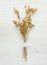 Beautiful Autumnal Easter Wedding Background. Dry Wild Flowers Tied with Silk Ribbon on White Wood. Minimalist Japanese Style