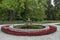 Beautiful autumnal venerable forest with fountain and flower in National monument of landscape architecture Park museum Vrana