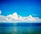 Beautiful Azure Sea with Blue Sky and Clouds.