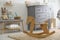 Beautiful baby room with toys, rocking horse and modern changing table