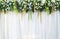 Beautiful backdrop flowers over white fabric