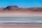 Beautiful background with Altiplanic Lagoon, a shallow saline lake and blue sky