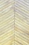 Beautiful background with a texture of thin wooden boards. A wall of pale yellow diagonal slats.