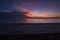 beautiful background of tropical sandy beach over magical twilight sunrise at dawn.