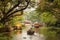 Beautiful backwaters landscape in Alleppey city with traditional passenger boats at sunset, Kerala