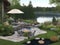 Beautiful backyard patio next to a lake, with chairs, a fire pit and a garden pond