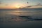 beautiful bahamas sunset with sea water on the summer beach