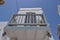 Beautiful Balconies In The Picturesque Streets Very Narrow Full Of Shops In Chora Island Of Mikonos .Arte History Architecture