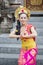 Beautiful Balinese dancer smiling at the camera