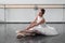 Beautiful ballerina posing in ballet class