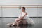 Beautiful ballerina posing in ballet class