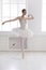 Beautiful ballerine dance in ballet position