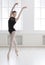 Beautiful ballerine stands in ballet position