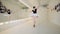 Beautiful ballet studio with a lady dancer executing spinning movements