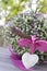 Beautiful basket with a stone heart and heather