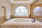 Beautiful bath tub in luxury bathroom