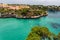 Beautiful bay of Cala Ferrera with turquoise water and villas in Cala d`Or, Mallorca