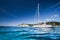 Beautiful bay with sailing boat, Mediterranean sea. Yachting, travel and active lifestyle concept