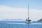 Beautiful bay with sailing boat yacht catamaran. Sail boat in a mediterranean sea. Yachting, travel, active lifestyle concept
