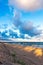 A beautiful beach on the Baltic Sea. Dunes, chiaroscuro, trees, grasses and golden sands. Pebbles on the beach scattered by the