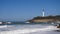 Beautiful beach in Biarritz city with the lighthouse in the background