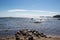 A beautiful beach and clear blue sky with people having fun and activities Helsinki Finland