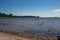 A beautiful beach and clear blue sky with people having fun and activities Helsinki Finland