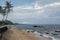 Beautiful beach with coconut tree, blue sea and white sand in the sky