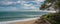 Beautiful beach at Costa Dorada in Miami Platja with a background of blue sky with clouds, Catalonia