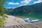 Beautiful beach lake achensee with standup paddling boards at the shore, austrian landscape