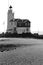 A beautiful beach and lighthouse at sunrise (Marken The Netherlands)