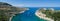 Beautiful beach panorama with boats on Rhodes island in Greece. Turquoise water and blue sky.