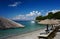 Beautiful beach with parasols and sun chairs