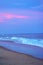 Beautiful beach view over the sunset colorful sky. Moving elements and wave photography from the beach in india. Dark blue sky in