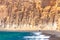 Beautiful beach with volcanic mountains. Vlychada beach, Santorini island