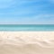 Beautiful beach with white sand near ocean, closeup