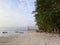 Beautiful beach with white sand, pine tree, fishing boat. Laguna beach, kaur, indonesia, south east asia.