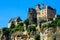 Beautiful Beynac castle standing up the cliff, Dordogne, France