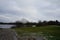 Beautiful Biesdorfer Baggersee lake surrounded by winter vegetation in January. Berlin, Germany